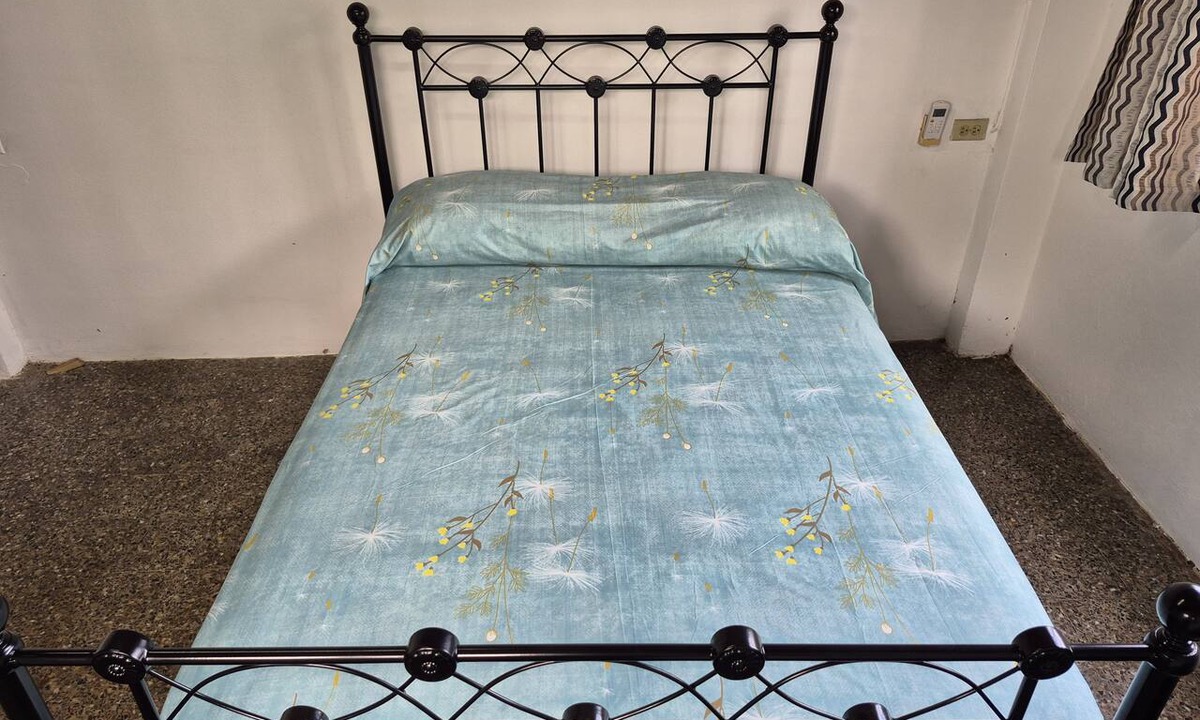 Woodbrook House | 1-bedroom in a 5 bedroom 2 bath house with AC in Woodbrook. Near Mas Camps.