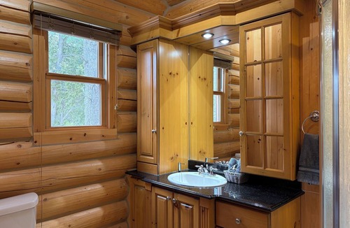 Fiddler Lake Resort Ski Chalet | Chal’Heureux | Private Spa, Log Cabin Retreat at Lac Fiddler | Dog Friendly