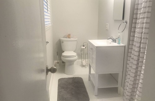 Gardens Condo | Gardens Gem! Recently renovated! Large covered front porch and sundeck in back for morning coffee or happy hour cocktails. Walk, bike or drive to beach. Comes with paid parking spot at Charlie Lot behind boardwalk!