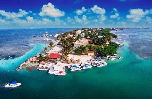 Caye Caulker Villa | OCEANFRONT ECO-CHIC HOME WITH INFINITY POOL, DOCK, AIR CONDITIONER & TV