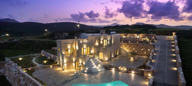 A private sanctuary above the Aegean . Sunlight, stillness, and the olive grove in Naxos