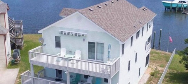 Canal Front Home with Private Dock, Multiple Decks & Hot Tub in Kill Devil Hills