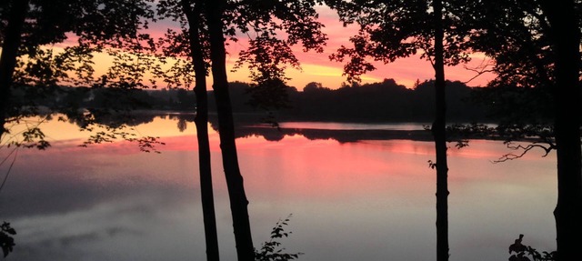 Lakefront Home atop a small bluff with Awesome views of Diamond Lake in White Cloud