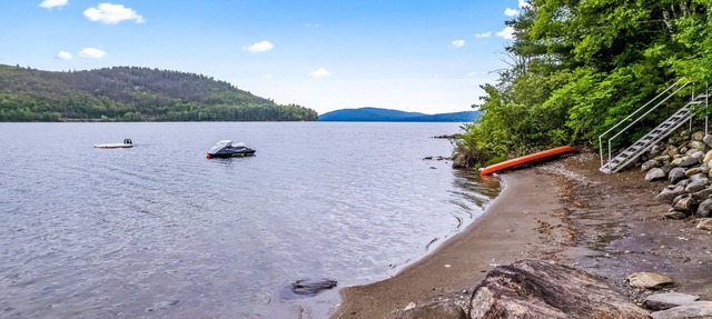 Lakefront home on beautiful Schroon Lake with private beach & dock- dog-friendly in Adirondack