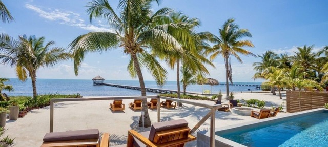 Luxury beachfront home with private pool, gym, & more! in Ambergris Caye