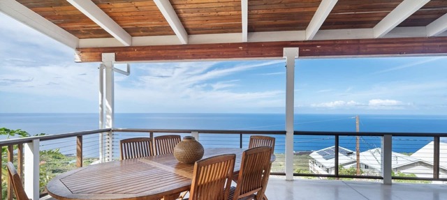 Panoramic Coastline Views In a Creative Tri Level Home in Captain Cook