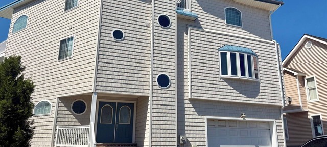 Spacious bayfront home in Avalon Manor with spectacular 360 degree views of the wetlands and inlet from the roof top deck. in Avalon