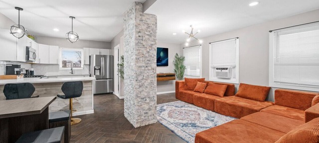 Steps from the train, minutes to NYC, sleeps 24 in style in Bayonne