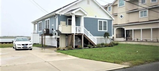 Bay-Front single family home that features expansive Intracoastal waterway views with easy Townsend inlet access in Avalon